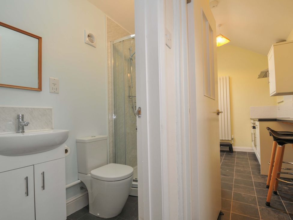 A bathroom with a sink and toilet at Violet's Rest in Exeter