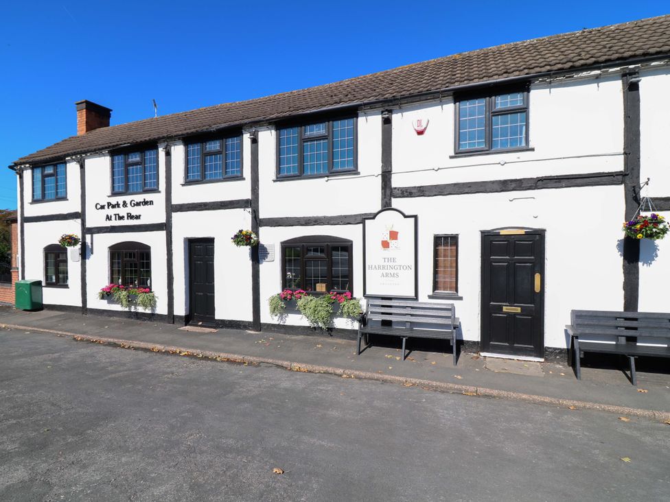 The exterior of The Harrington Arms with windows and signage at 6 Brook Court Thulston near Derby