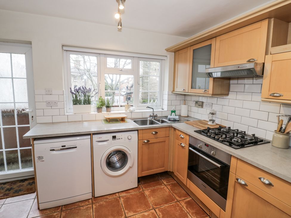 A kitchen with appliances and countertops at 3 Leycester Court Warwick