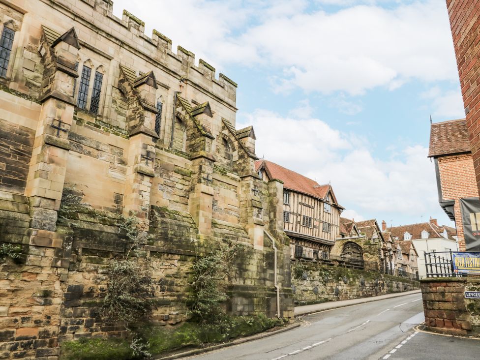 A view of historical buildings alongside a road at 3 Leycester Court Warwick