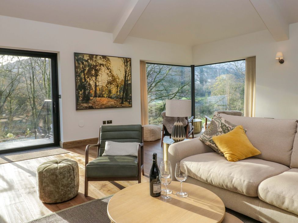 A living room with a sofa and coffee table at The Old Bunkhouse in Grasmere