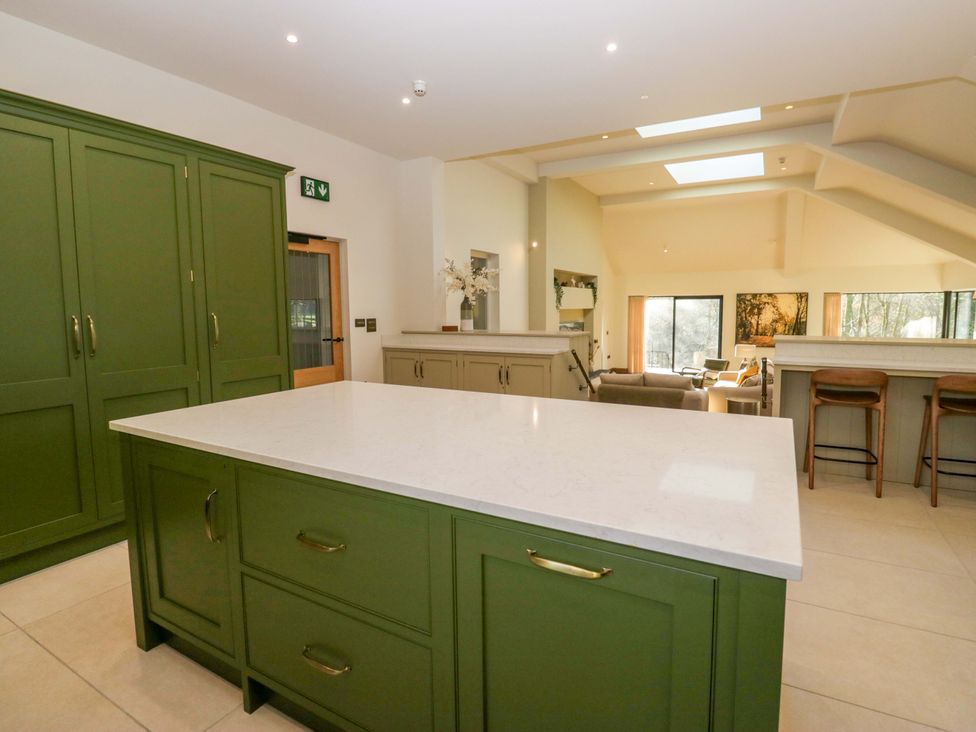 A kitchen with cabinets and a countertop at The Old Bunkhouse in Grasmere