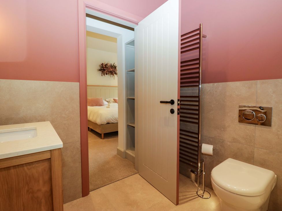 A bathroom with a sink and toilet at The Old Bunkhouse in Grasmere