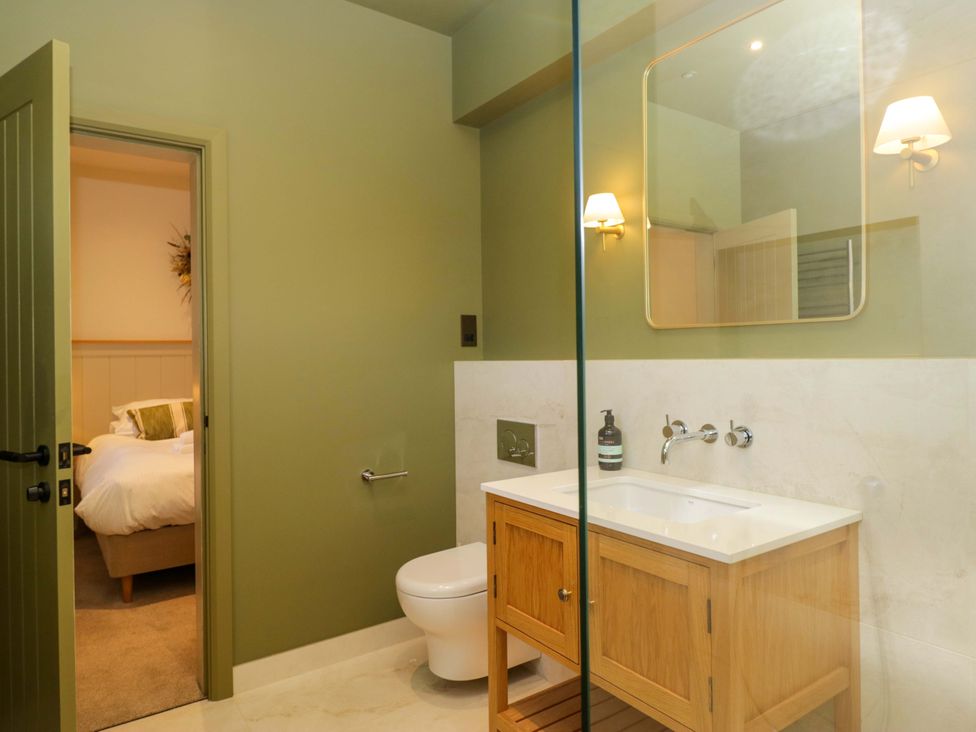 A bathroom with a sink and toilet at The Old Bunkhouse in Grasmere