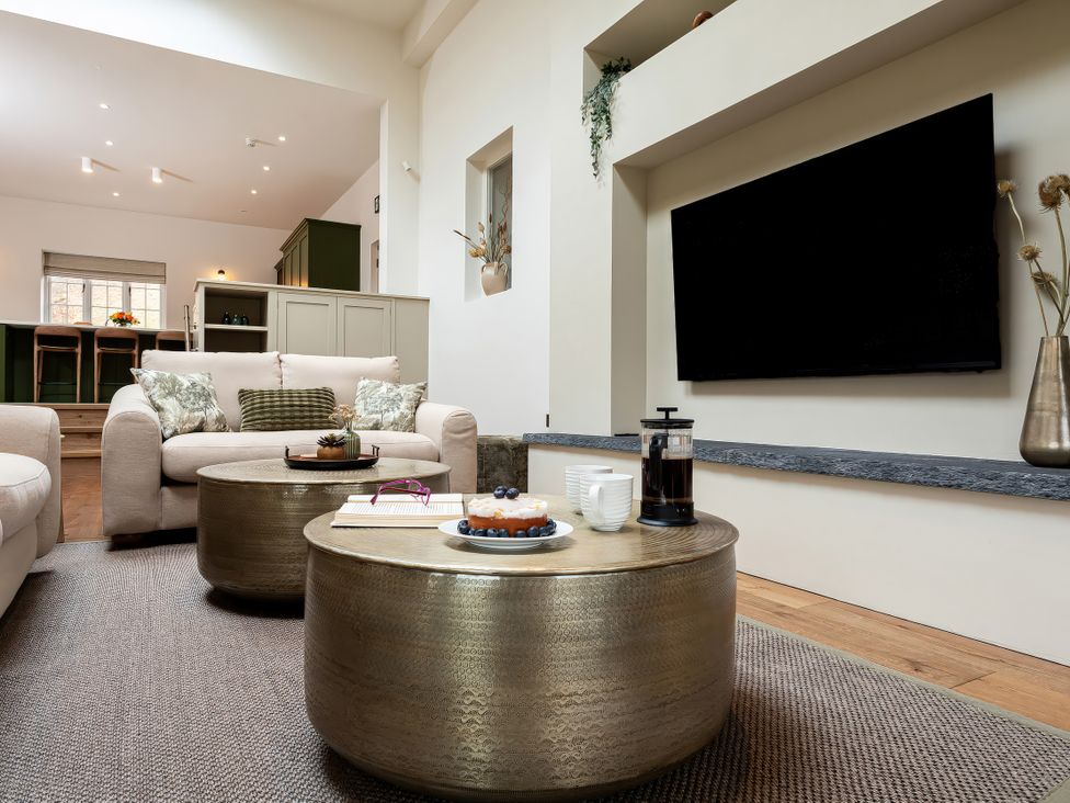 A living room with a coffee table and sofa at The Old Bunkhouse in Grasmere