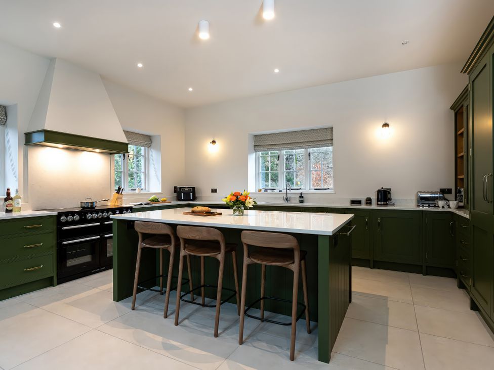 A kitchen with a kitchen island and appliances at The Old Bunkhouse in Grasmere
