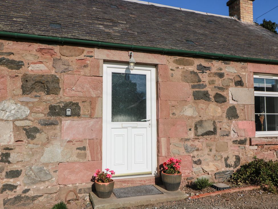 A front entryway with a door and window at The Bothy in Blairgowrie