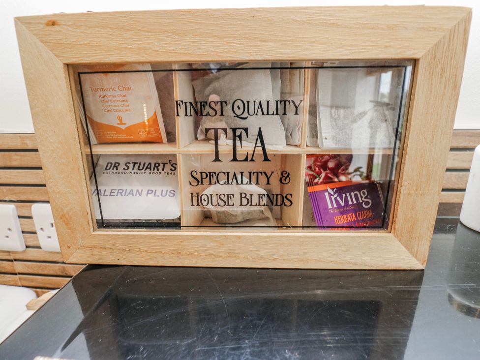 A container displaying various types of tea at The Retreat 