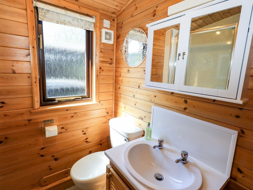 A bathroom with a sink and toilet at Watendlath in Keswick