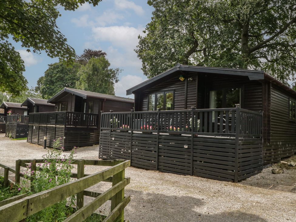 Log cabins with porches in a natural setting at Watendlath, Keswick