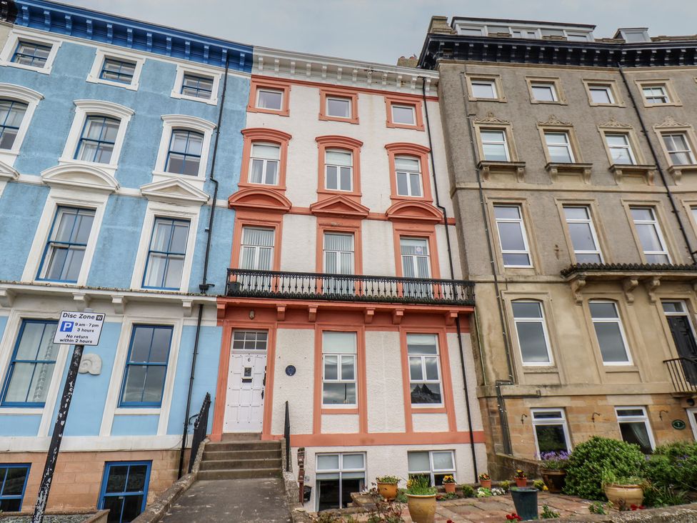 A building with colored facades and windows at The Studio on the Crescent Whitby