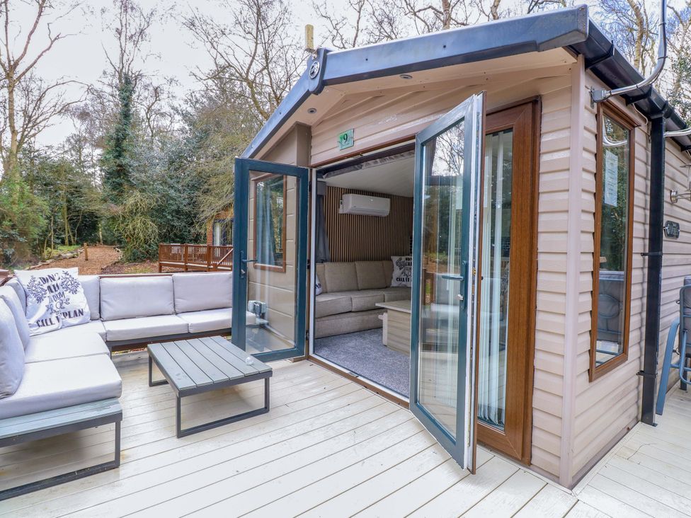 A living room with a sofa and coffee table at Wild Duck Holiday Park Belton Norfolk