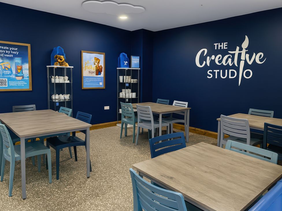 A creative studio with tables and chairs at Littlesea Holiday Park - Holiday Accommodation 13127, Weymouth