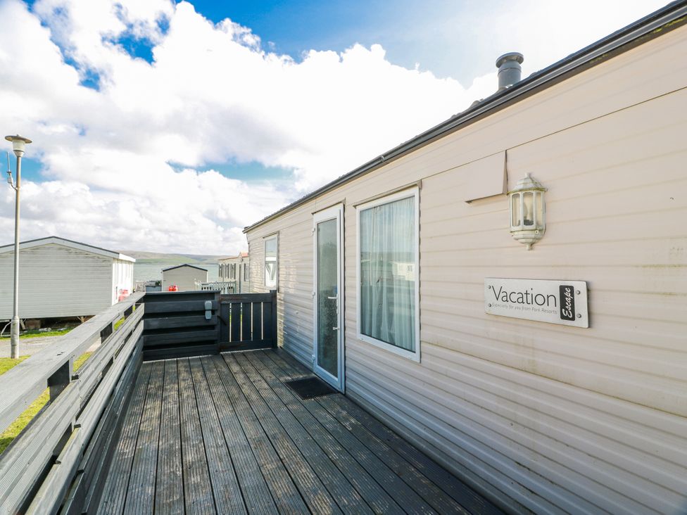 A vacation home exterior with a deck at WigBay Holiday Park - Holiday Accommodation 16774 Stranraer