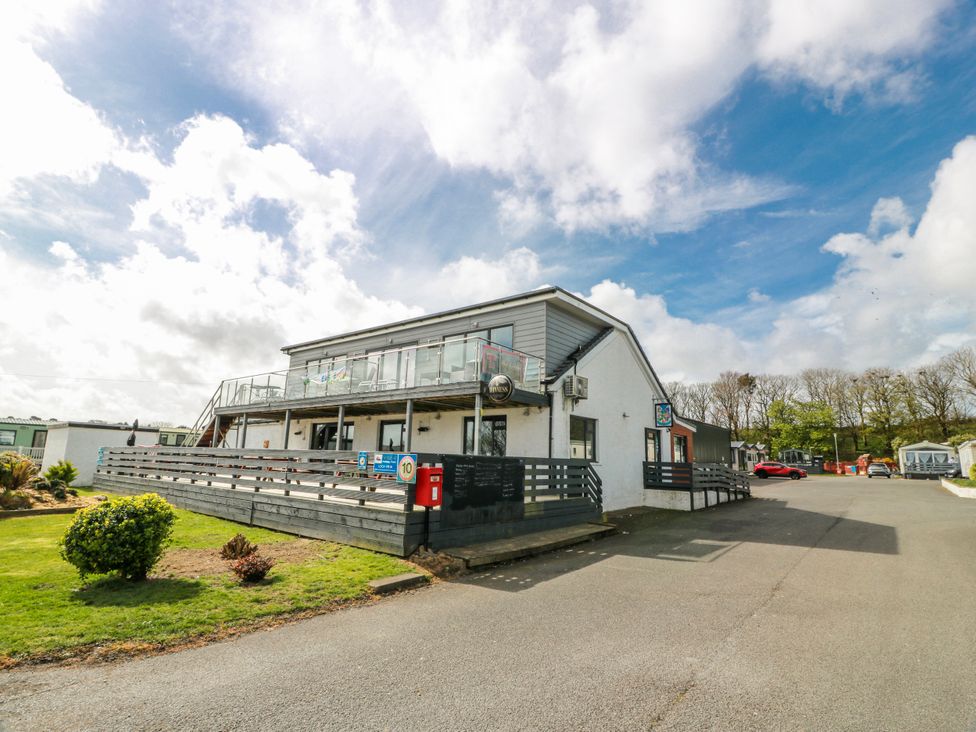 A building with steps and a railing at WigBay Holiday Park - Holiday Accommodation 16774 in Stranraer