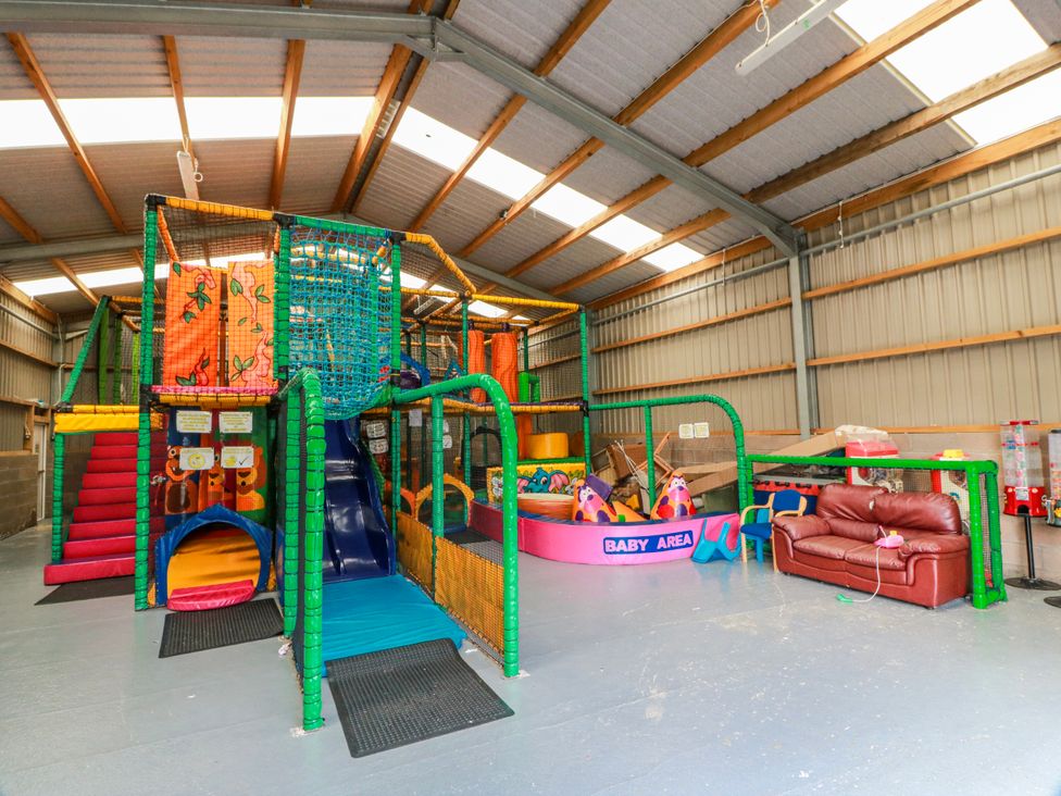 A play area with slides and soft play equipment at WigBay Holiday Park - Holiday Accommodation 16774 Stranraer