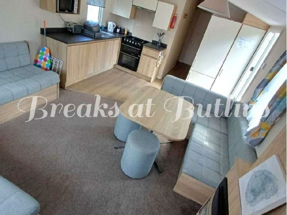 a kitchen area with seating and a table at Butlins Minehead - Holiday Accommodation 18045, Minehead