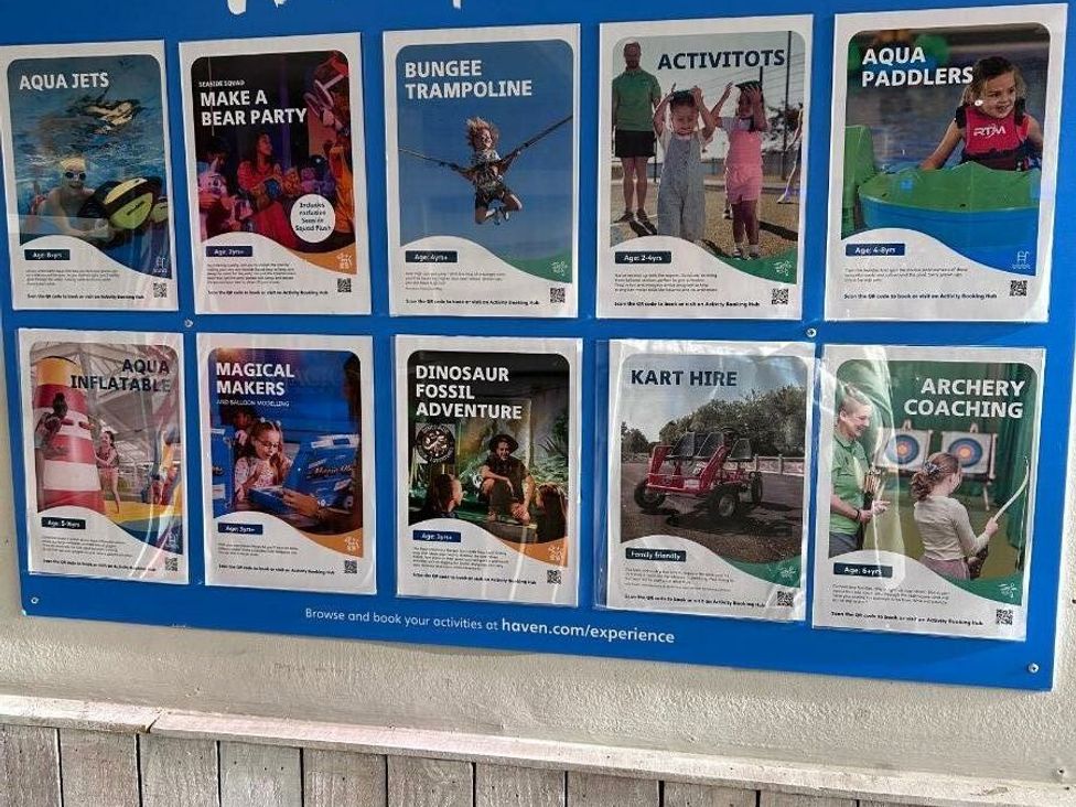 a poster display featuring various activities like aqua jets, bungee trampoline, and archery coaching at Cala Gran Holiday Park - Holiday Accommodation 21106, Fleetwood