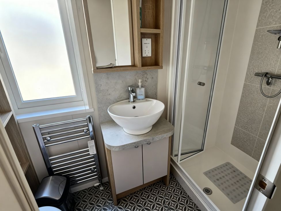A bathroom with a sink and shower at Ocean Edge Leisure Park - Holiday Accommodation 21286 in Morecambe