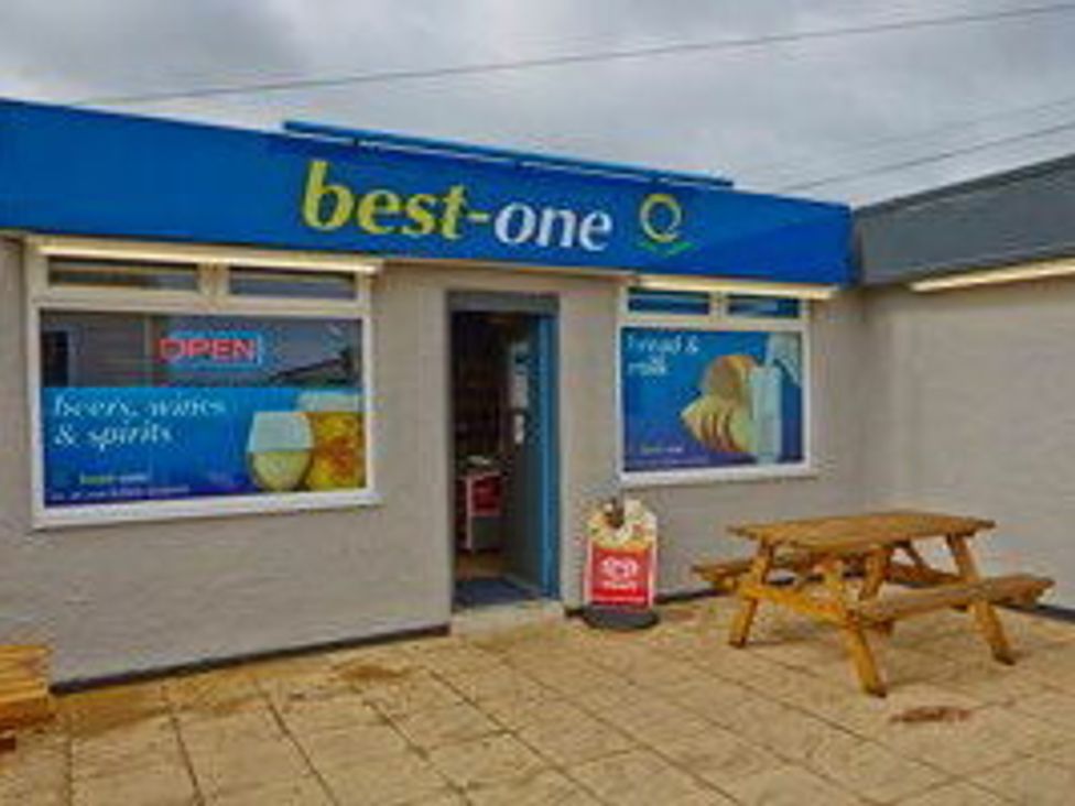 a storefront of best-one with outdoor seating at Whitehouse Leisure Park - Holiday Accommodation 21355 in Towyn
