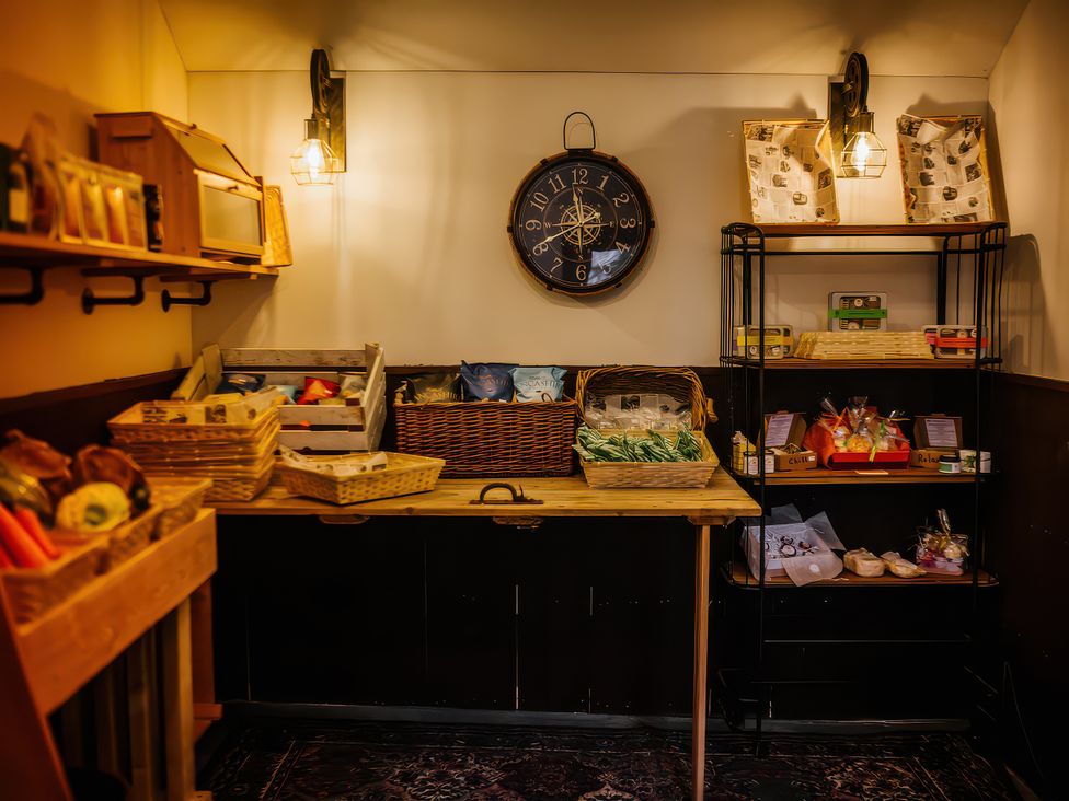 A store interior with shelves and baskets at The Snug in Overton near Heysham