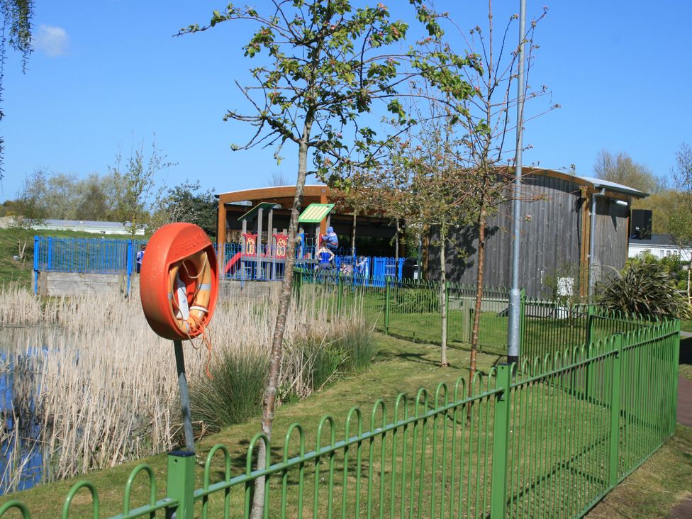 An outdoor area with a lifebuoy and a building at Southview Holiday Park 7251 Skegness