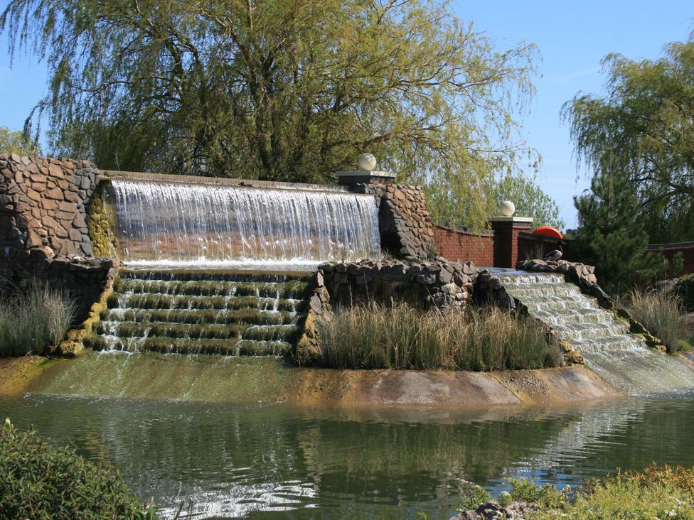 A waterfall feature with steps and pond at Southview Holiday Park 7251 Skegness
