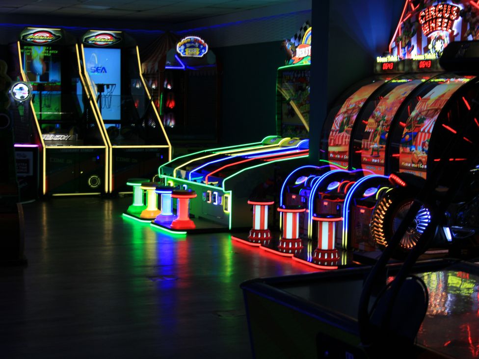 An arcade with various games including basketball and skeeball at Southview Holiday Park 7251, Skegness
