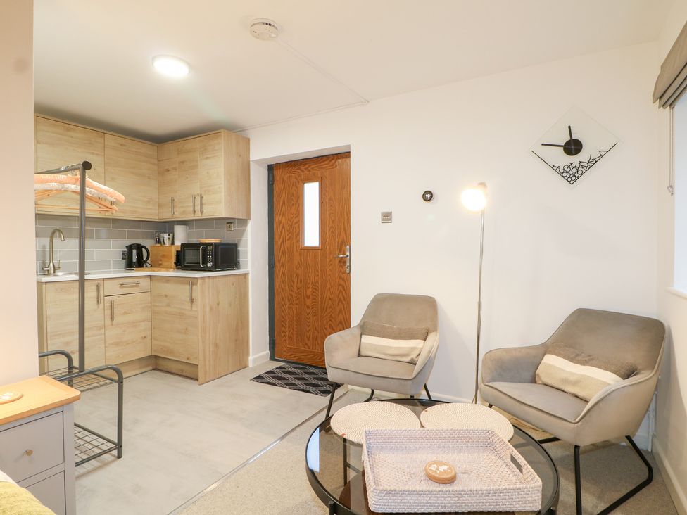 A studio with kitchen and seating area at The Bullpen in West Tytherley