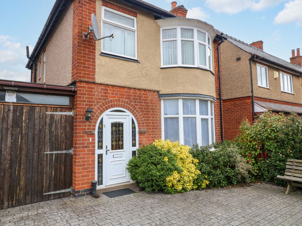 A house with a front garden and bench at 5 Wallace Road Loughborough