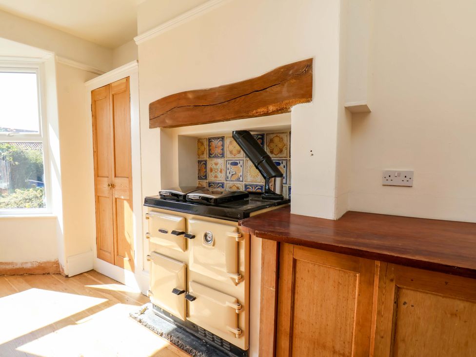 A kitchen with an oven and countertop at 22 The Lane Saltburn-by-the-Sea