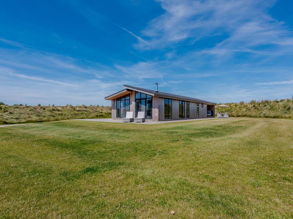 A house with large windows and a patio area at Wordsworth in Wigton