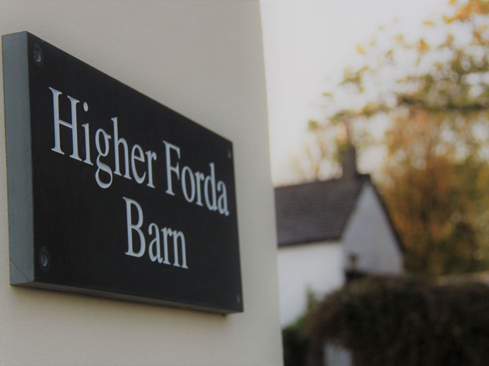 A sign for Higher Forda Barn in Holsworthy