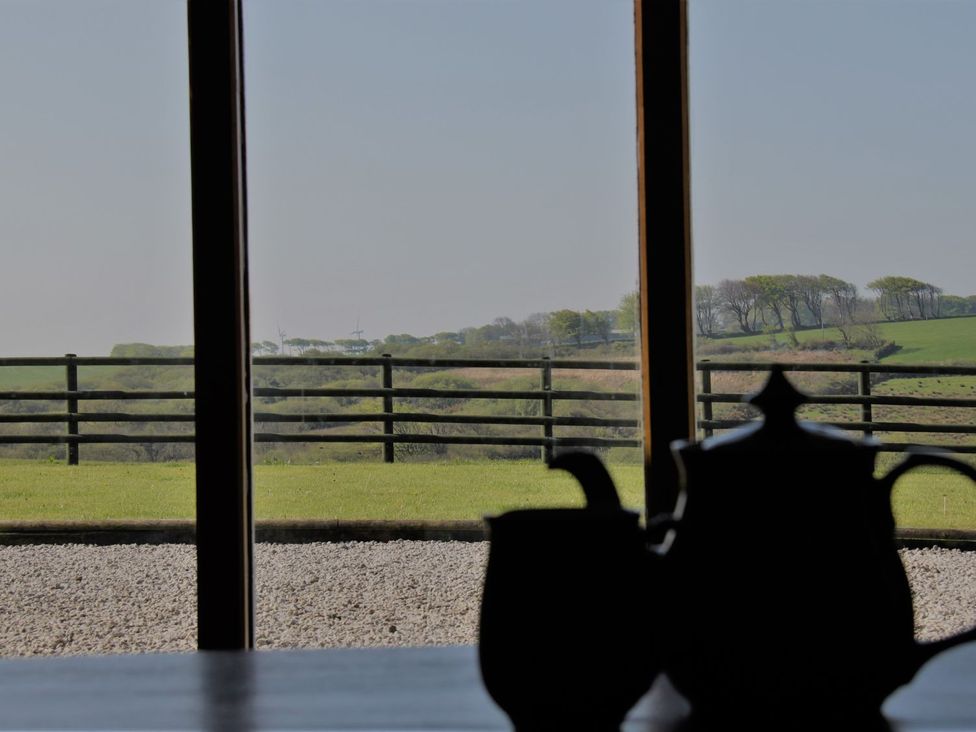 A view from a window showing a teapot and milk jug at Higher Forda Holsworthy