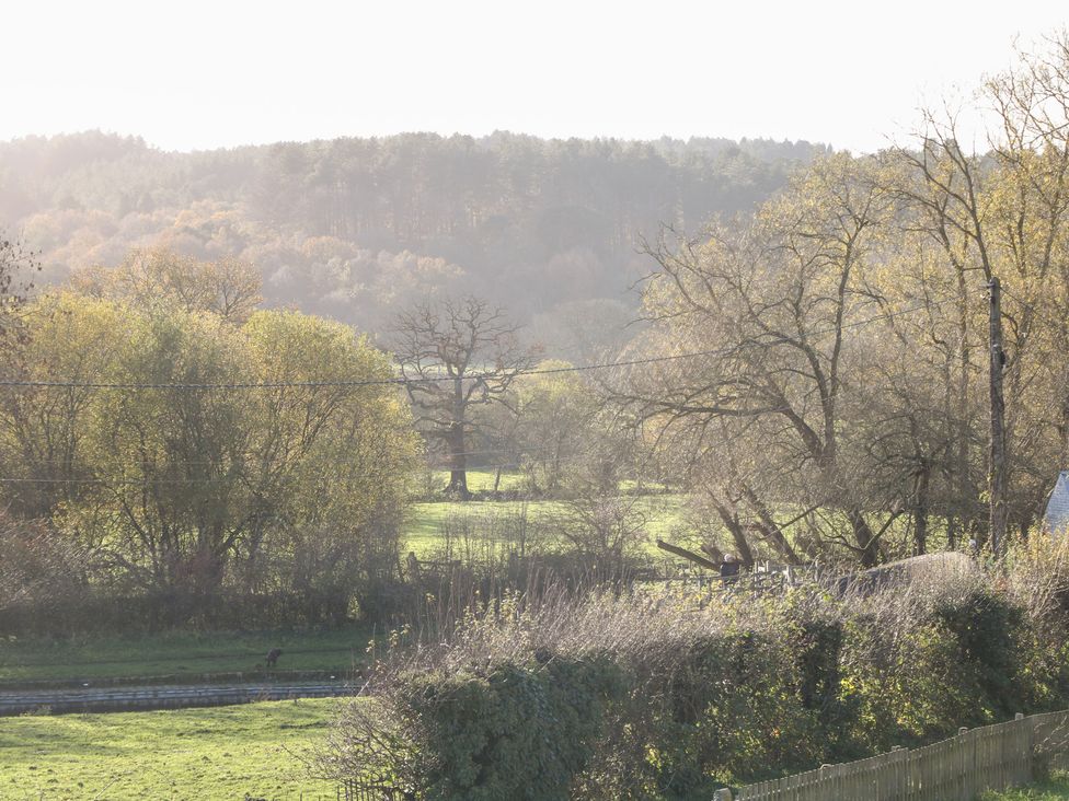 A view of trees and hills in a field at Shunter’s Nook Colwich