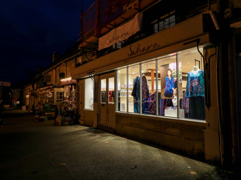 A clothing store with display window at 6 Priory Lane Burford