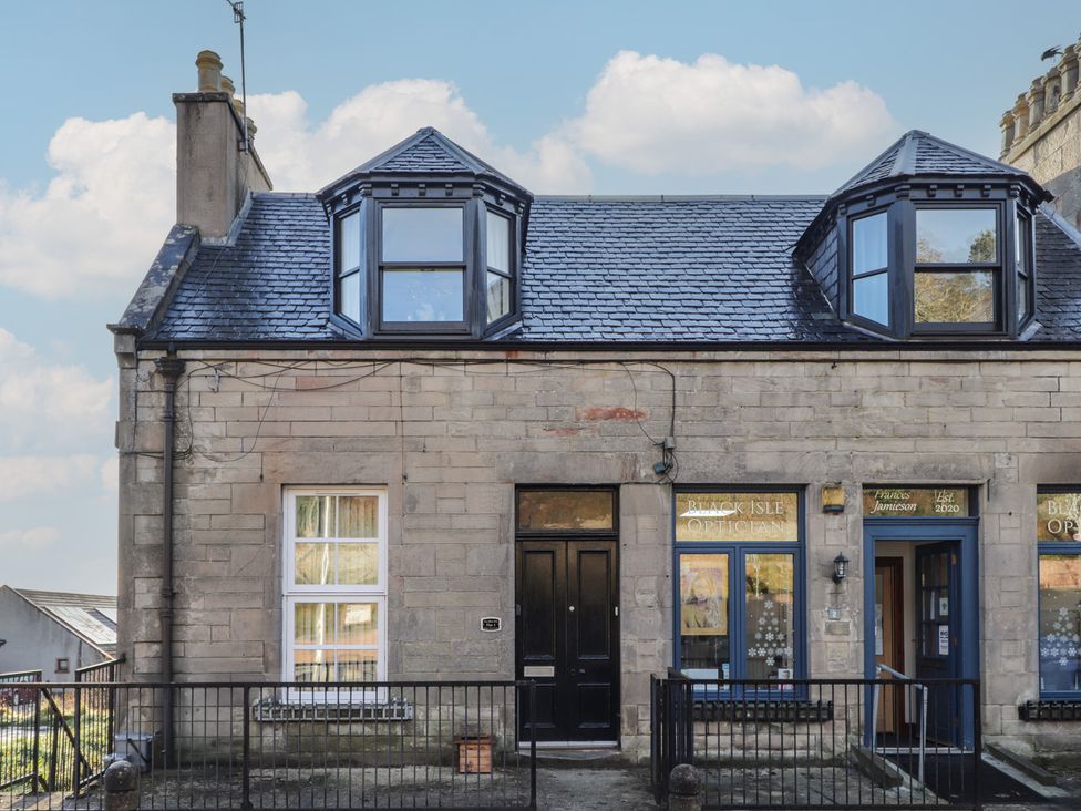 A house with windows and a door at Wee Flat Avoch