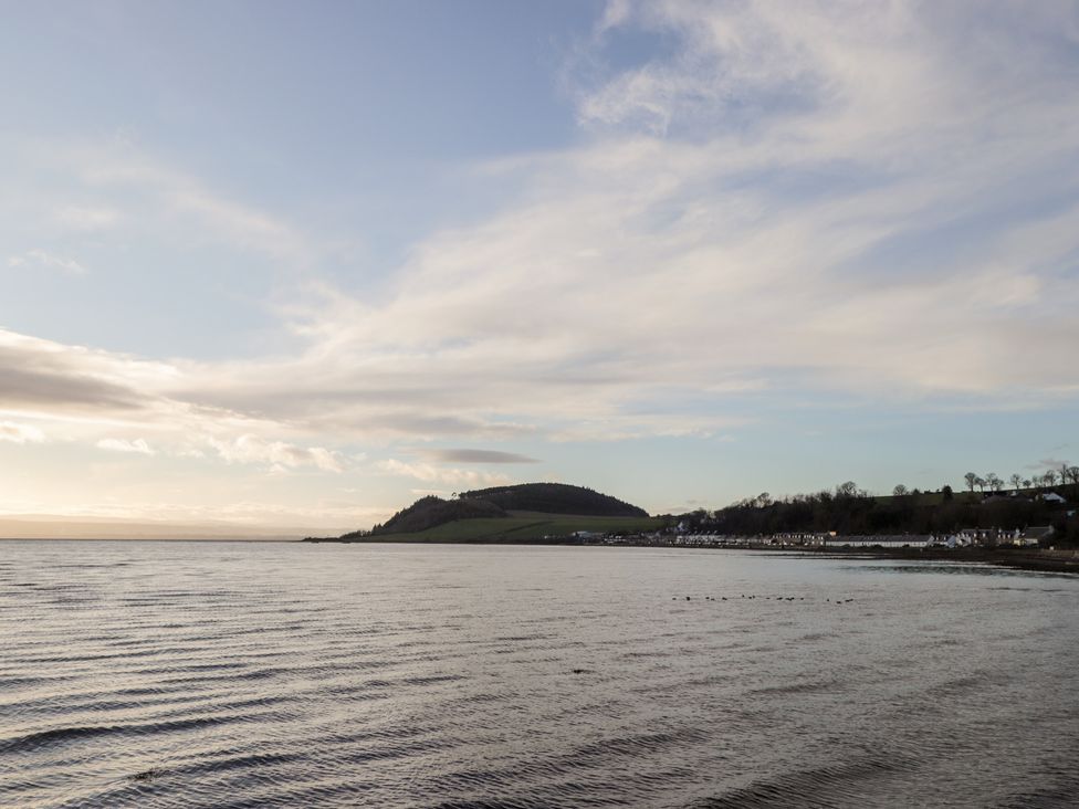 A view of water and hills at Wee Flat in Avoch