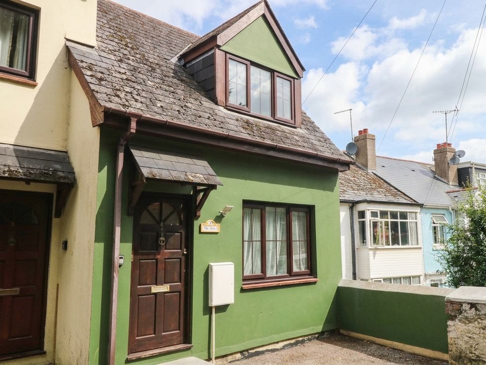 A house with a green exterior and a front door at The Gables in Teignmouth