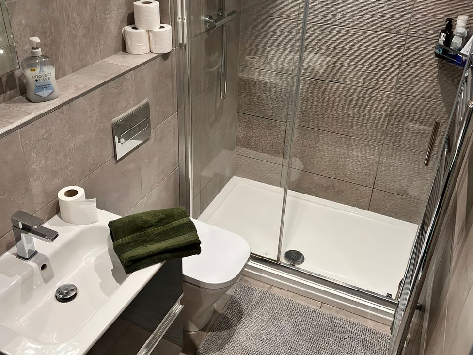 A bathroom with a shower and sink at Cosy Southampton Apartment in Southampton