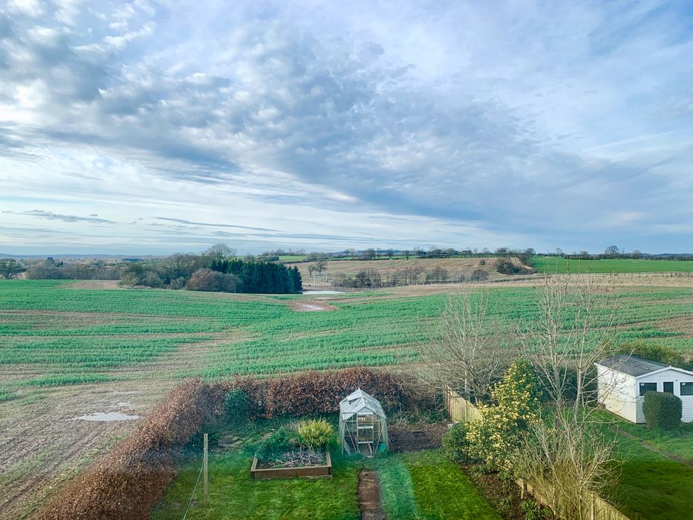 A view of fields and a greenhouse at Scamnel in Eccleshall