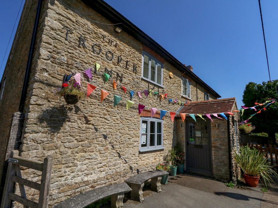 An outdoor view of The Trooper Inn with decorations at The Old Barn in Stourton Caundle near Stalbridge