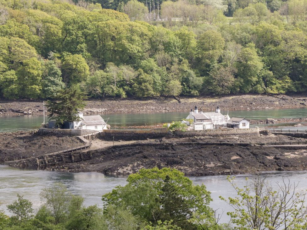 A view of houses on land surrounded by water at Trigfa, Brynsiencyn near Llanfairpwllgwyngyll
