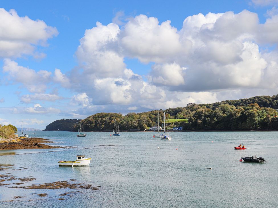 A view of boats on water with clouds in the sky at New build at Tyn Pwll Llanfairpwllgwyngyll