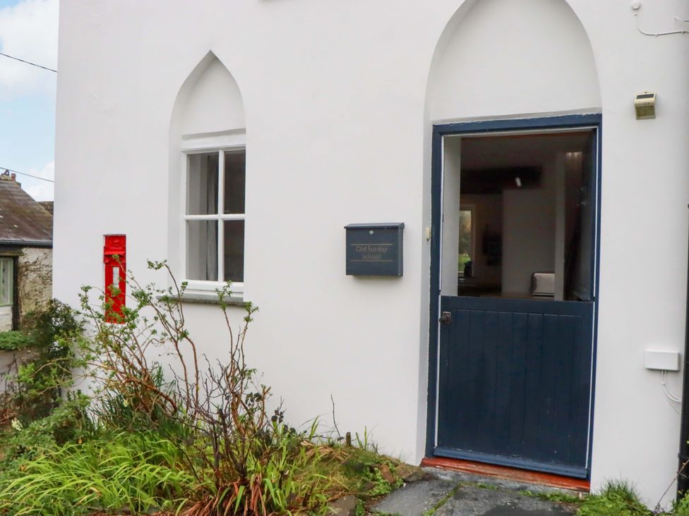 An entrance with a door and window at Old Sunday School in Welcombe near Kilkhampton