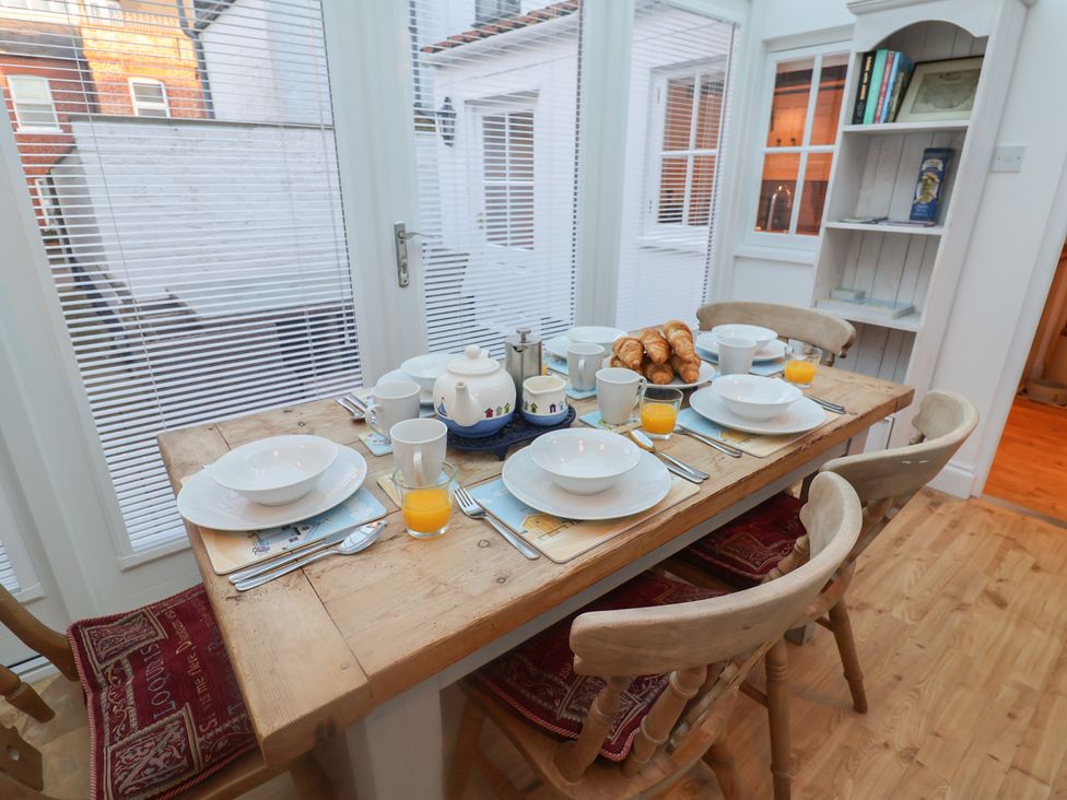 A dining room table set for breakfast at Nutshell in Aldeburgh