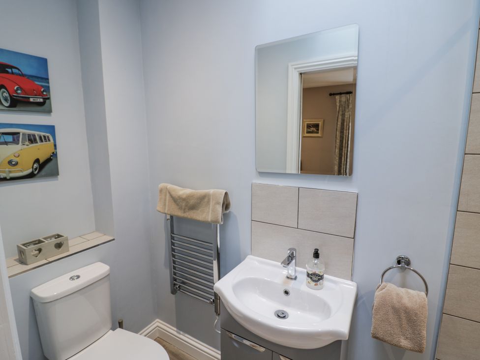 A bathroom with a toilet and sink at Lily Stables Black Bourton near Bampton Oxfordshire