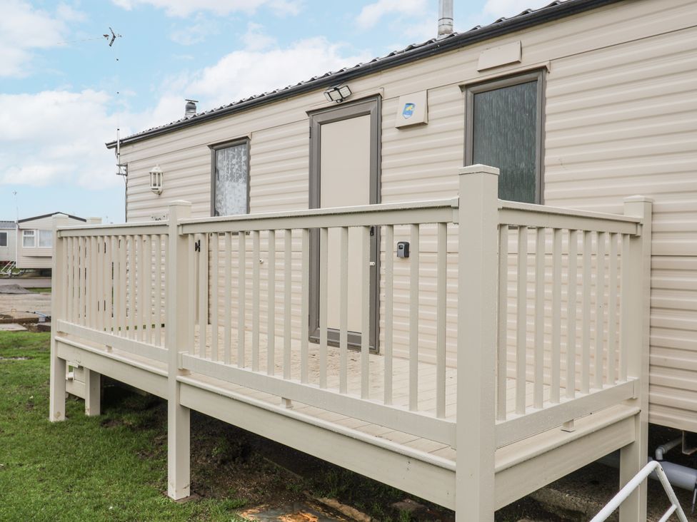 A deck in front of a caravan at Singh Leite & Luisa Family Caravan in St. Osyth