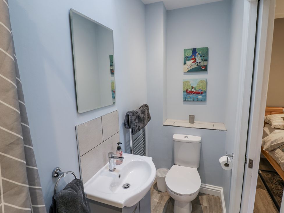 A bathroom with sink and toilet at Rose Stables Black Bourton near Bampton