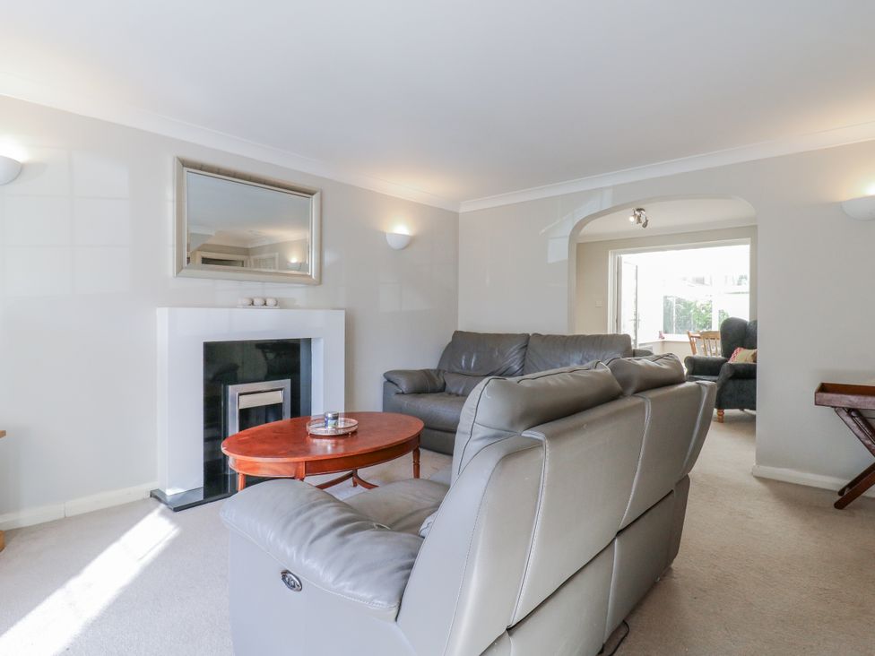 A living room with a sofa and coffee table at 32 Abbey Gardens